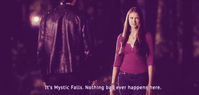 Woman In Purple Shirt Says It's Mystic Next To Man In Black Jacket GIF