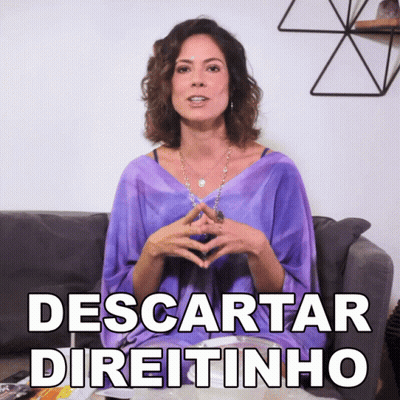 Woman In Purple Shirt Sitting On Couch Descartar Direitinho GIF