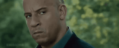 Woman In Purple Shirt Standing By 7Wickreddy Sign GIF