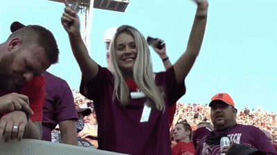Woman In Purple Shirt With Number 1 GIF