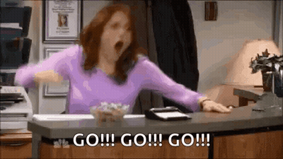 Woman In Purple Shirt Yelling With Arms Outstretched GIF