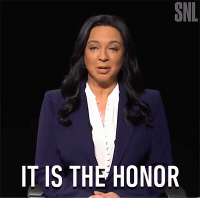 Woman In Purple Suit Saying It Is The Honor GIF