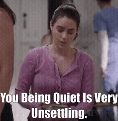 Woman In Purple Sweater Being Quiet GIF