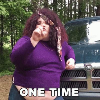 Woman In Purple Sweater In Front Of Dodge Truck Saying One Time GIF