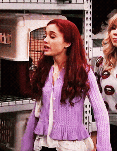 Woman In Purple Sweater Near Kennel Crate GIF