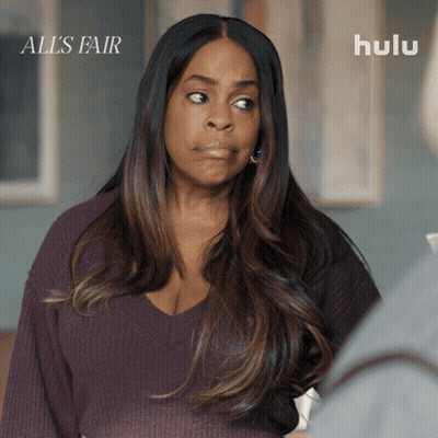 Woman In Purple Sweater Saying All's Fair GIF