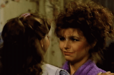 Woman In Purple Sweater Stirring Soup GIF