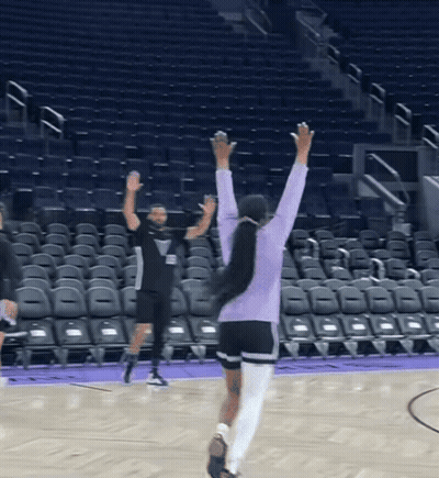 Woman In Purple Sweatshirt On Basketball Court GIF
