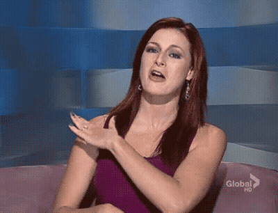 Woman In Purple Tank Top On Pink Couch GIF
