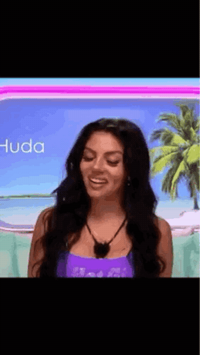 Woman In Purple Tank Top Smiling GIF