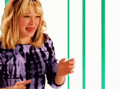 Woman In Purple Tie Dye Dress With Green White Striped Wall GIF
