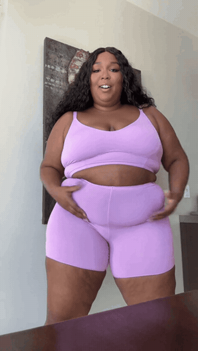 Woman In Purple Top And Shorts GIF