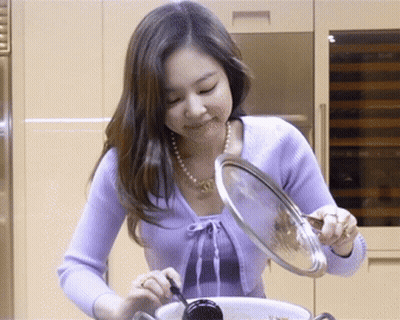 Woman In Purple Top Opening Pot Lid GIF