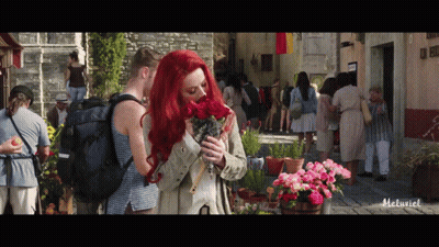 Woman In Purple Top Saying Life Sucks I Need A Drink GIF