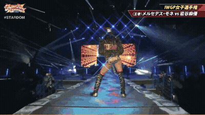Woman In Purple Wrestling Outfit Shaking Hands With Man In Truck GIF