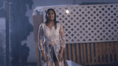 Woman In Rain With Umbrella And Neha Sign GIF