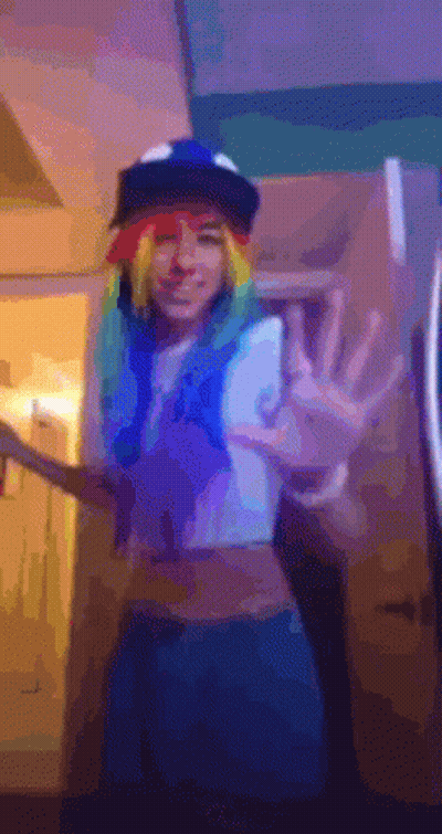 Woman In Rainbow Dash Costume Making Stop Sign GIF
