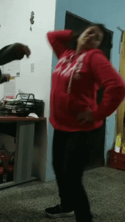 Woman In Red Abercrombie Sweatshirt Dancing GIF