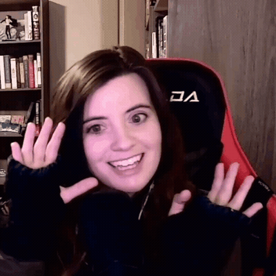 Woman In Red And Black Gaming Chair With Letter A GIF