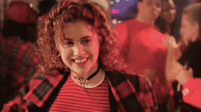 Woman In Red And Black Striped Shirt Smiling GIF
