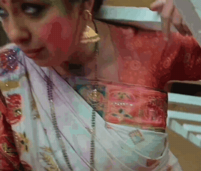 Woman In Red And White Dress Holding White Box GIF