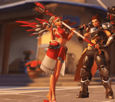 Woman In Red And White Outfit Holding Sword Next To Man In Armor GIF