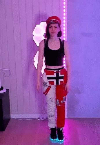 Woman In Red And White Pants Saying AJ GIF