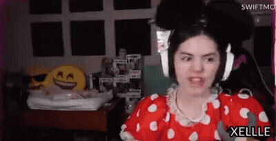 Woman In Red And White Polka Dot Dress Wearing Headphones GIF