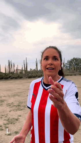 Woman In Red And White Striped Shirt In Cactus Field GIF