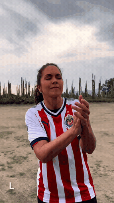 Woman In Red And White Striped Shirt With L GIF