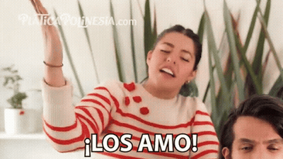 Woman In Red And White Striped Sweater Saying Los Amo GIF
