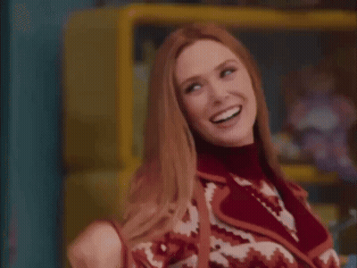 Woman In Red And White Sweater Smiling GIF