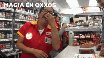 Woman In Red And Yellow Uniform Laughing By Magia En Oxxos Sign GIF