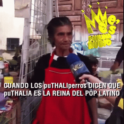 Woman In Red Apron Interviewed With Microphone GIF