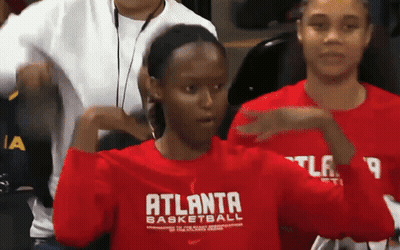 Woman In Red Atlanta Basketball Sweatshirt GIF