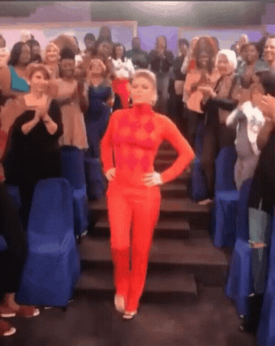 Woman In Red Bodysuit Dancing GIF