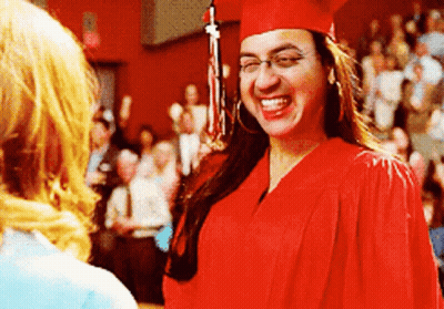 Woman In Red Cap And Gown Smiling GIF