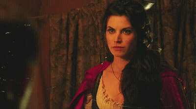 Woman in Red Cape Looking