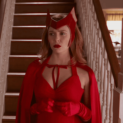 Woman In Red Cape On Stairs GIF