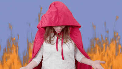 Woman In Red Cape Screaming GIF