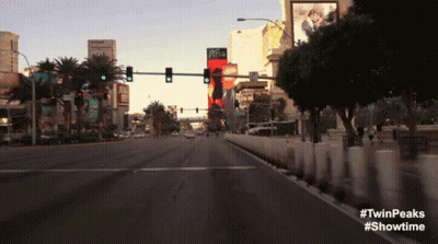 Woman In Red Cape Talking To Woman GIF