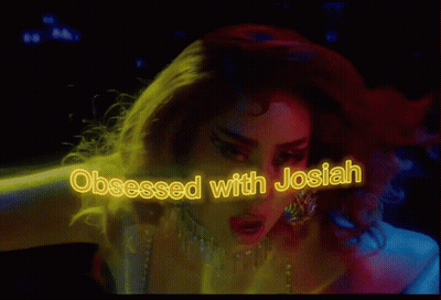 Woman In Red Cat Mask And Pink Gloves GIF