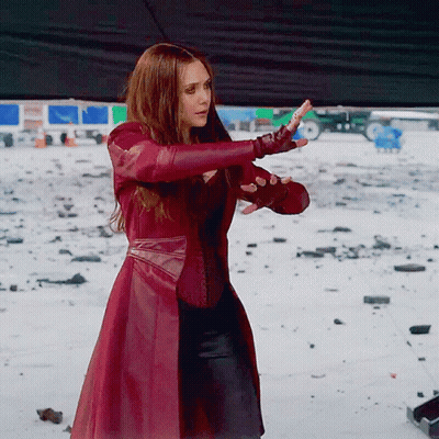 Woman In Red Coat And Gloves In Snow GIF
