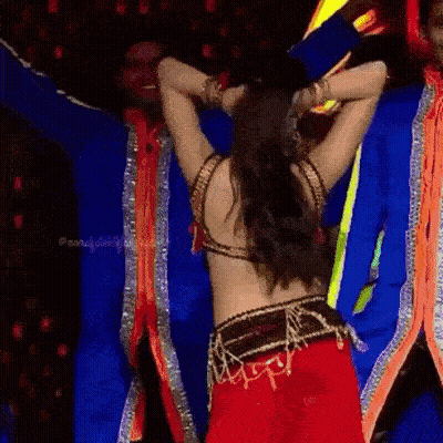 Woman In Red Costume Dancing On Stage GIF