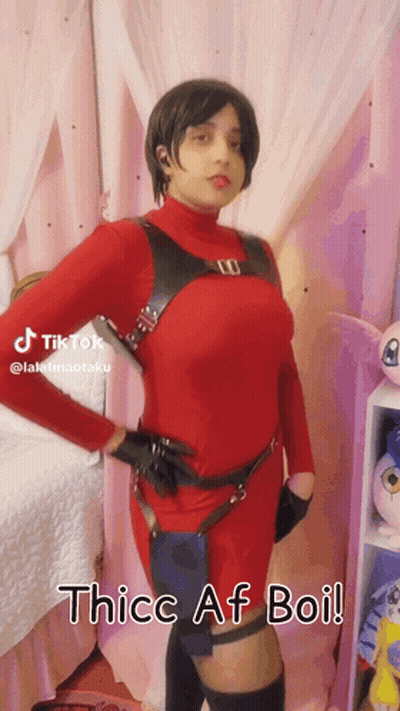 Woman In Red Costume In Front Of Pink Curtain Thice Af Boi GIF