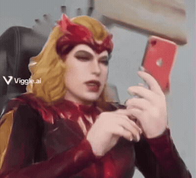 Woman In Red Costume Taking Selfie GIF