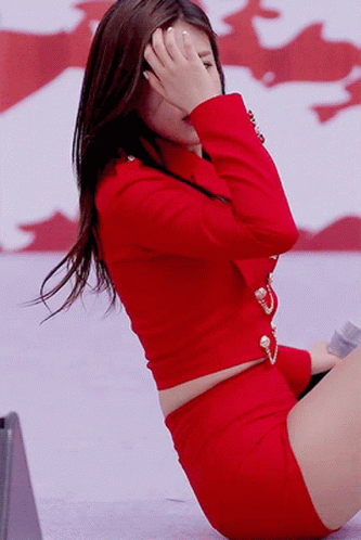 Woman In Red Covering Face GIF