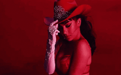 Woman In Red Cowboy Hat And White Gloves GIF