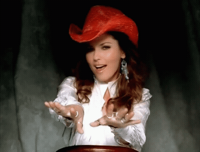 Woman In Red Cowboy Hat And White Shirt GIF