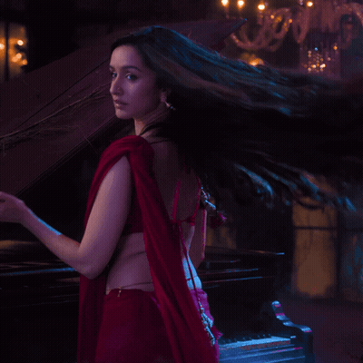 Woman In Red Crop Top And Red Saree GIF